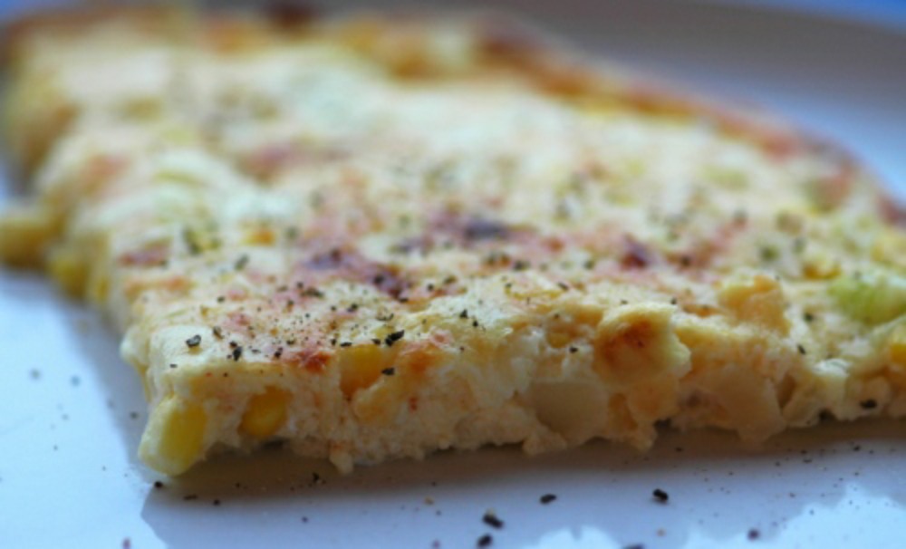 Spanish omelette, a close up picture of a slice
