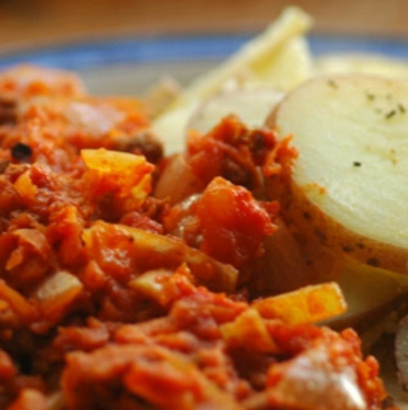 cottage pie on a blue rimmed plate