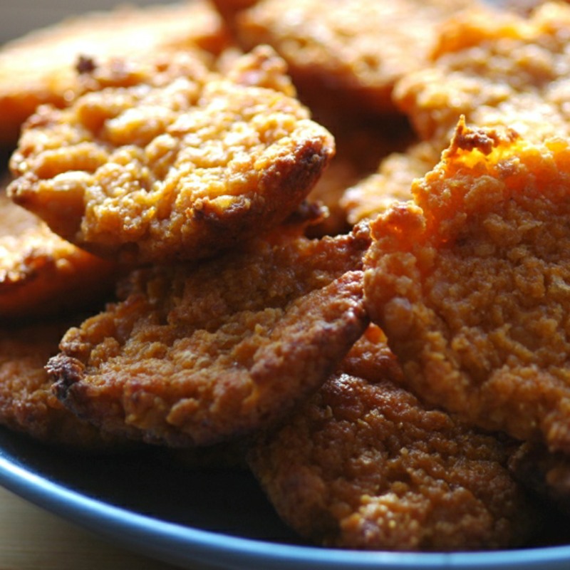 savoury bites on a plate with a blue rim