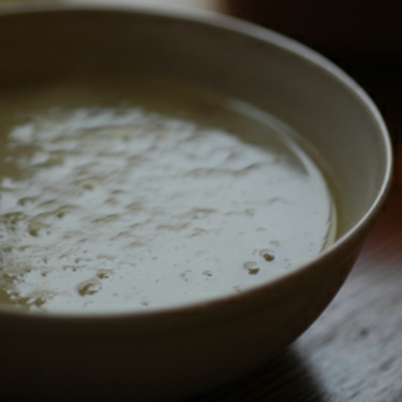 potato and onion soup in a creamy coloured bowl