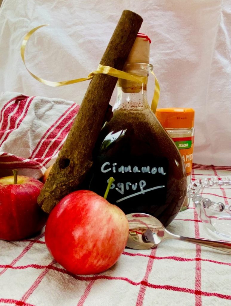 simple cinnamon syrup in a glass bottle