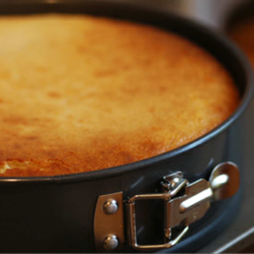 lemon cheesecake in the tin it was baked in