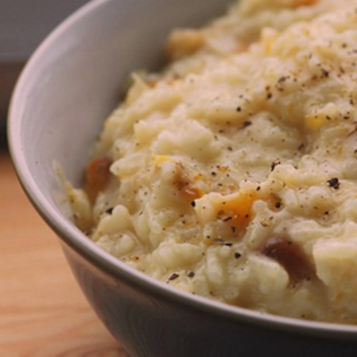 butternut sqaush risotto in a white dish.